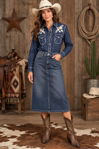 A blue patterned denim western-style shirt jacket with white floral embroidery on the chest.